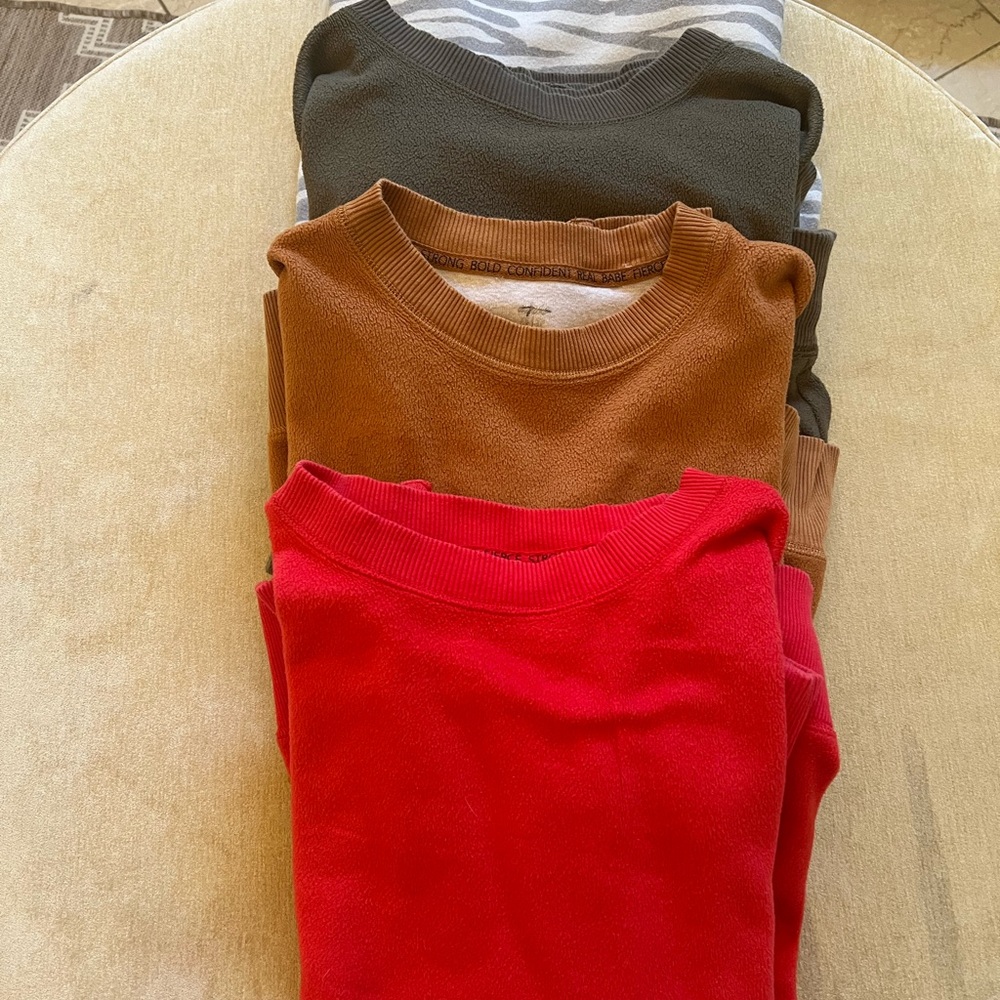 Set of four sweatshirts - Aerie Red, Rust ,Olive and Grey Zebra  Sweatshirts.